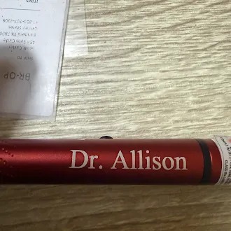 Red metal pen laser engraved with Dr. Allison